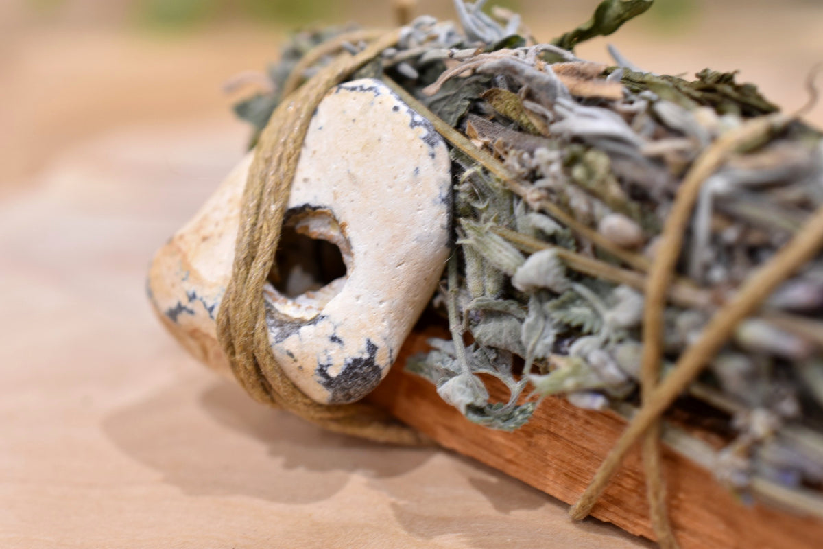 Guardian’s Wand handmade by Yarrow Moon with garden-grown botanicals and South Coast hag stone