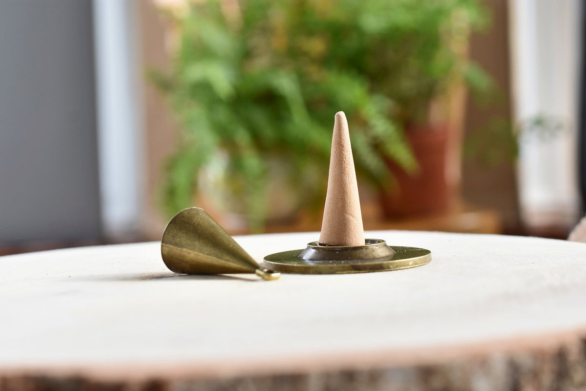 Wellspring cedarwood incense with brass incense holder.