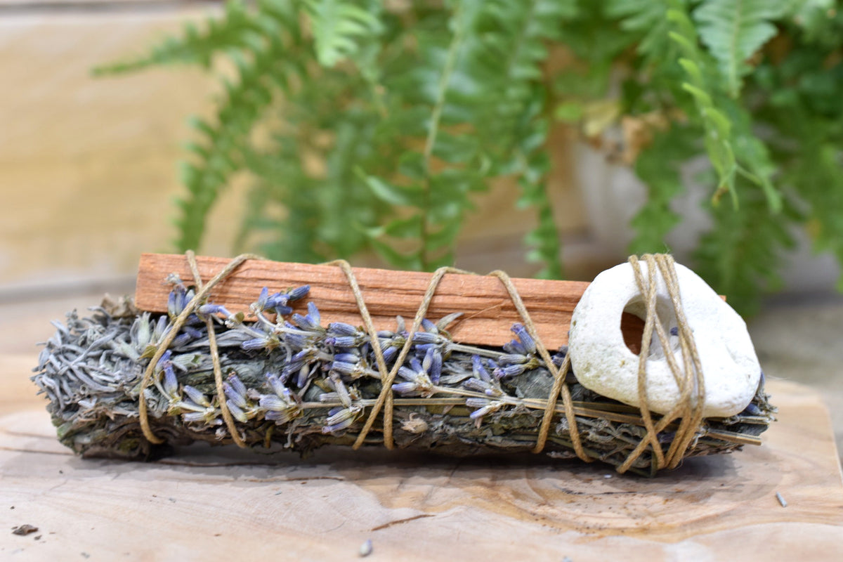 Guardian’s Wand with lavender, catnip, dandelion, Palo Santo and natural hag stone