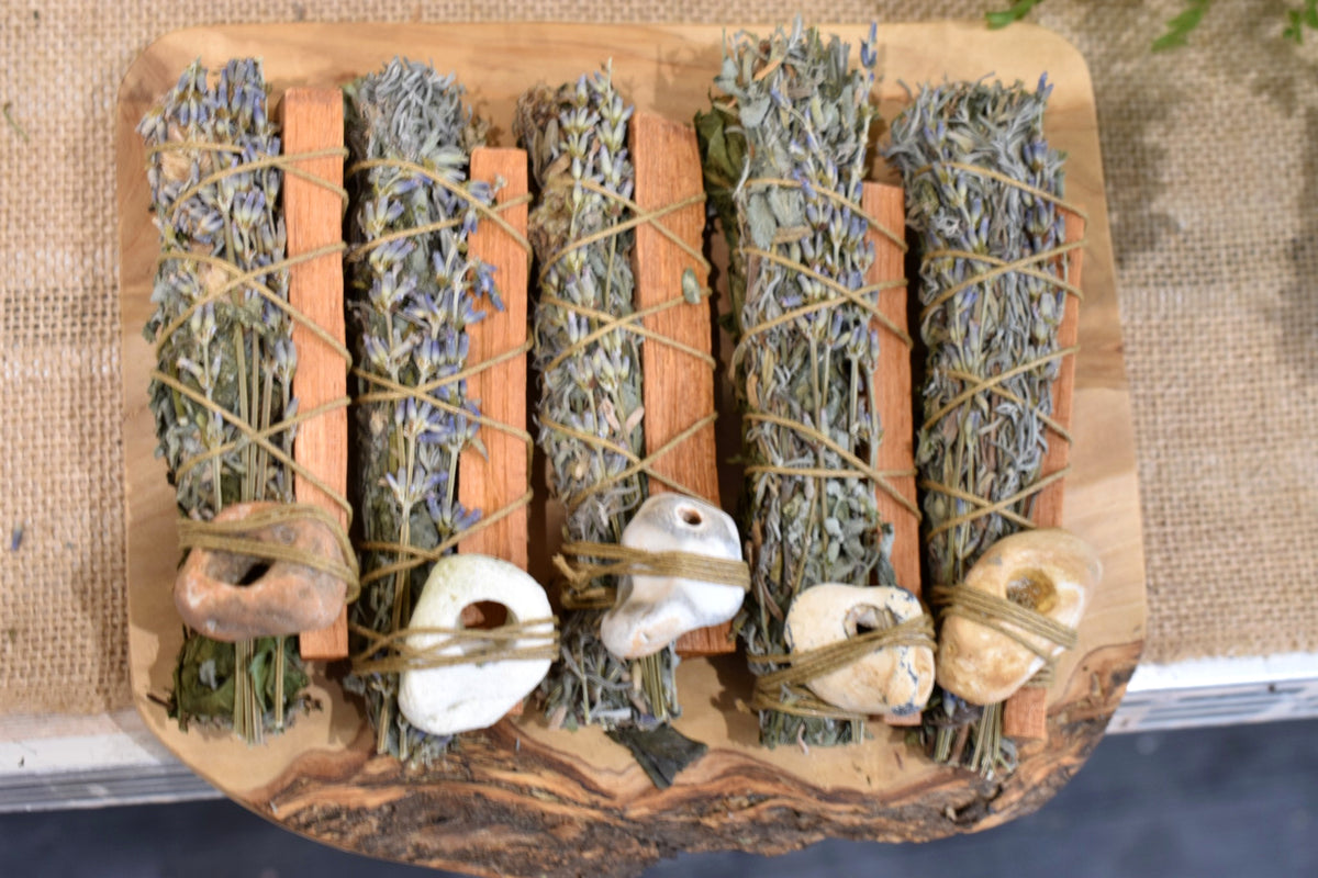 Guardian’s Wand handmade from Yarrow Moon garden botanicals with Palo Santo and hag stone
