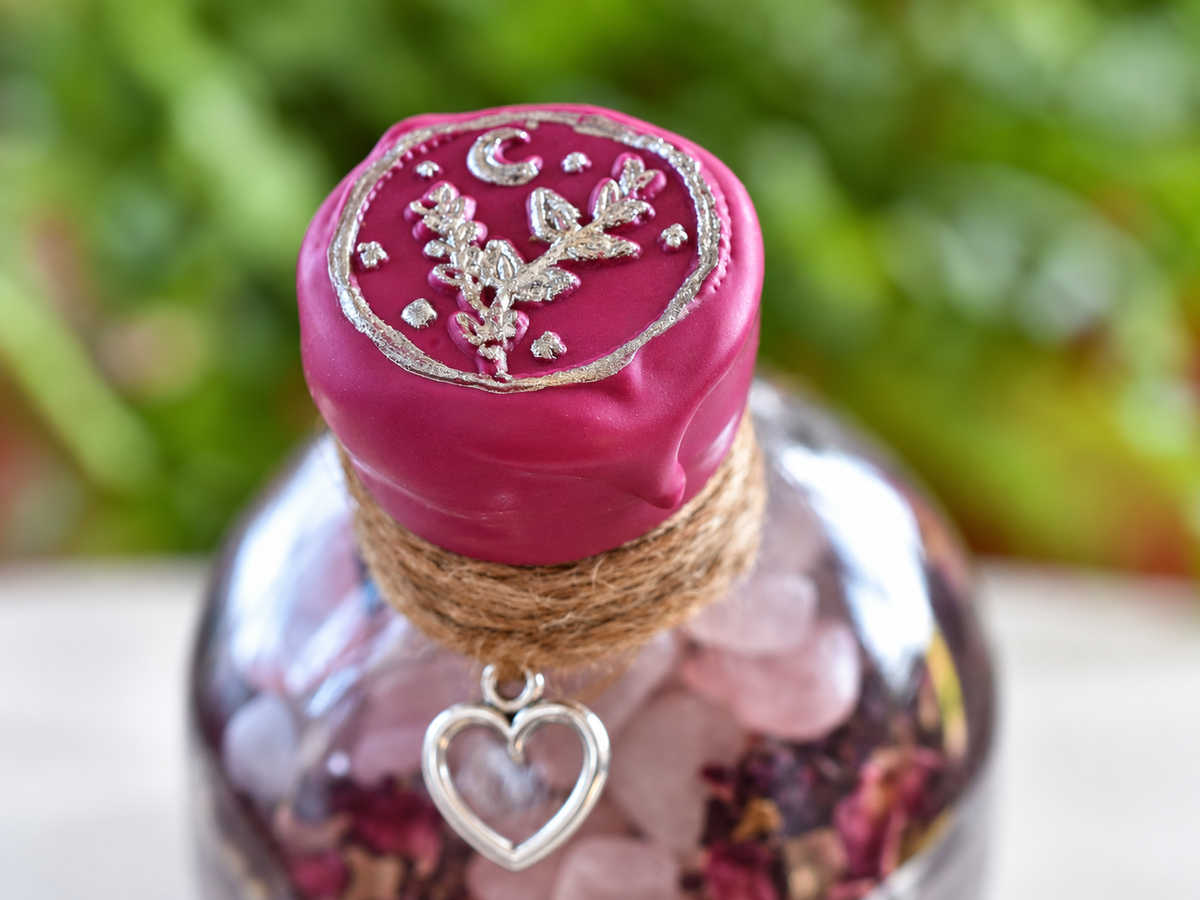 Love & Harmony pink wax seal detail