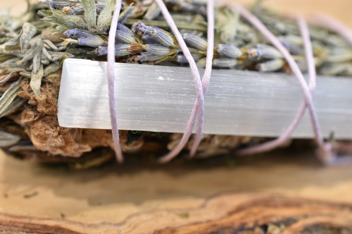 Moon Ward Wand close detail showing selenite and hand-bound dried botanicals