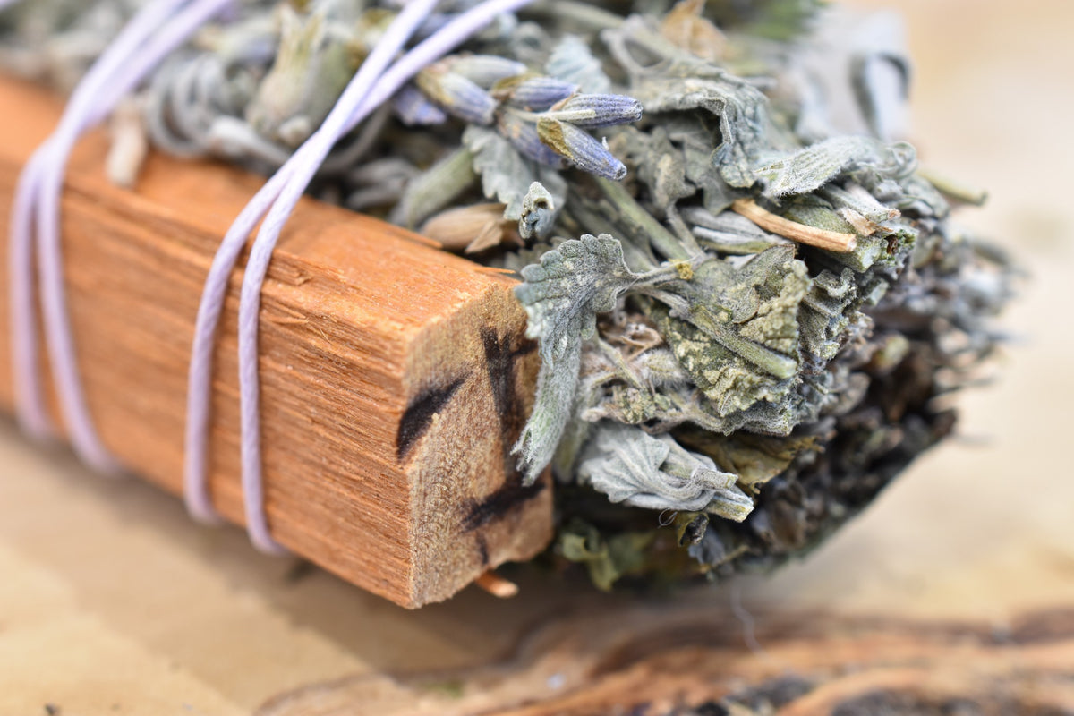 Moon Ward Wand detail with Palo Santo wood and hand-tied dried herbs